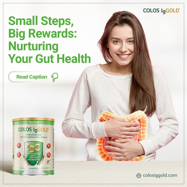 This ad creative features a person smiling while holding a visual overlay of the digestive system, promoting a powdered dairy drink for gut health.